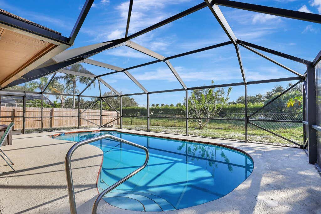 Photo of 138 SW Oakridge Drive, Port Saint Lucie, FL 34984 (MLS # R11046813)