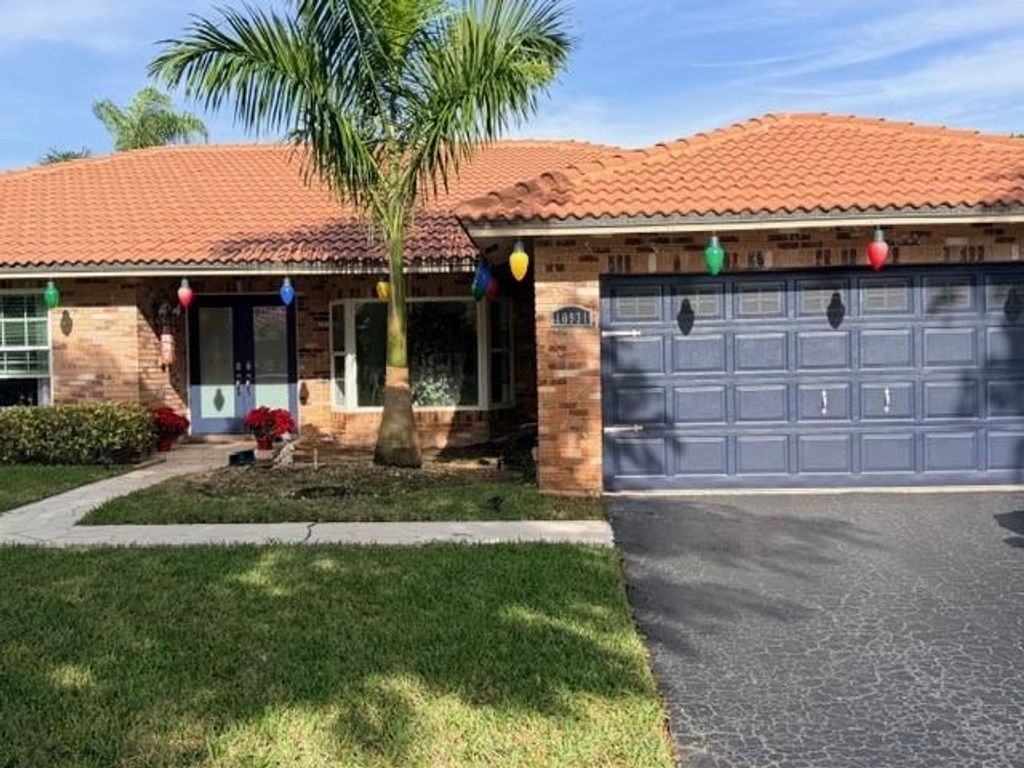 Photo of 10931 NW 4th St, Coral Springs, FL 33071 (MLS # F10540791)