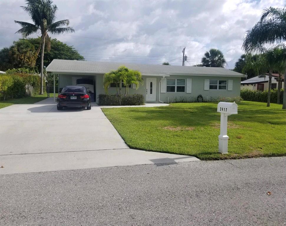 Photo of 2417 S Wallen Drive, Palm Beach Gardens, FL 33410 (MLS # R10718282)