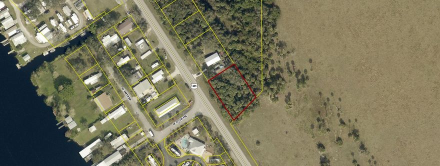 Discover the perfect opportunity to build your dream home, weekend getaway, or investment property on this spacious vacant lot located along Hwy 441 SE in Okeechobee County. Offering exceptional accessibility, this property provides convenient proximity to Lake Okeechobee, local shops, dining, and major roadways. Whether you're looking to create a private residence, bring in a manufactured home, or hold as an investment, this versatile parcel is full of potential. Don't miss your chance to own land in one of Okeechobee's growing areas!