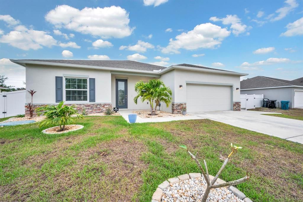Photo of 1433 SW Leisure Lane, Port St Lucie, FL 34953 (MLS # R10881358)