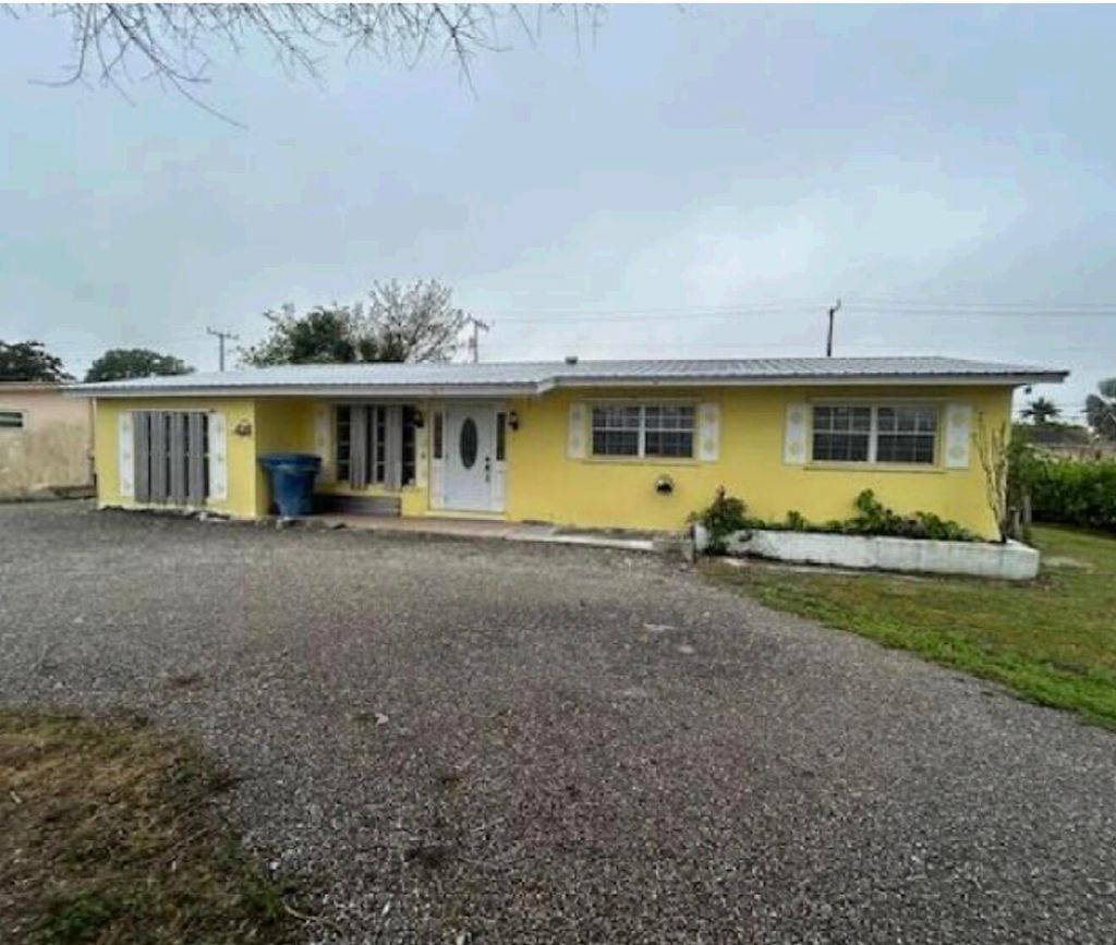 Photo of 740 SE 2nd Street, Belle Glade, FL 33430 (MLS # B26001170)