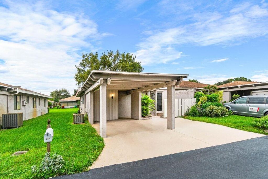 Photo of 6844 Moonlit Drive, Delray Beach, FL 33446 (MLS # R11030271)