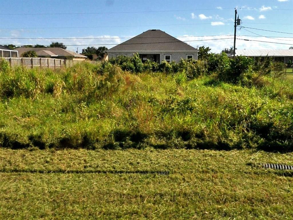 Photo of 3501 SW Rivera Street, Port Saint Lucie, FL 34953 (MLS # R10722264)