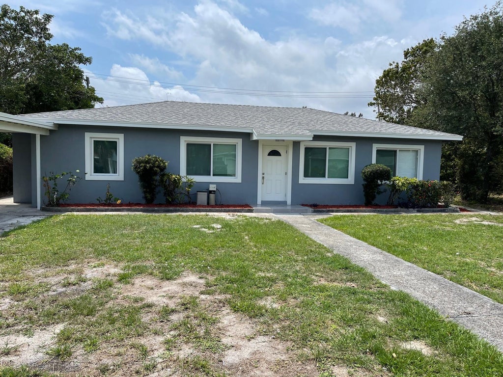 Photo of 1038 MACY Street, West Palm Beach, FL 33405 (MLS # B26070431)