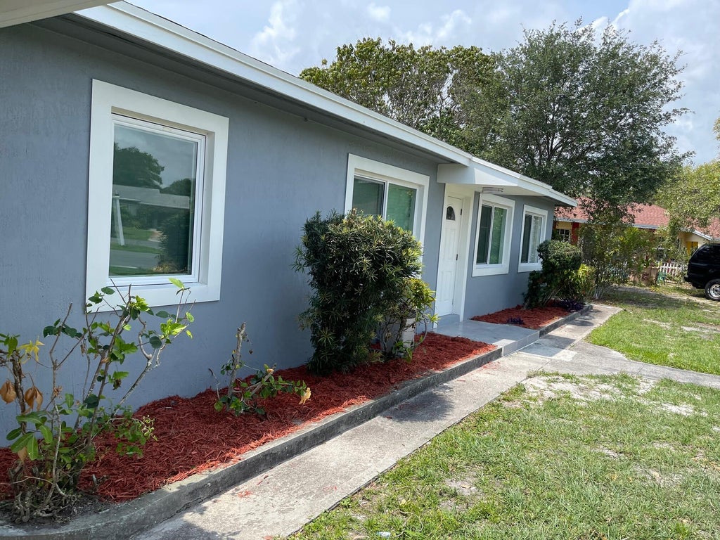 Photo of 1038 MACY Street, West Palm Beach, FL 33405 (MLS # B26070431)