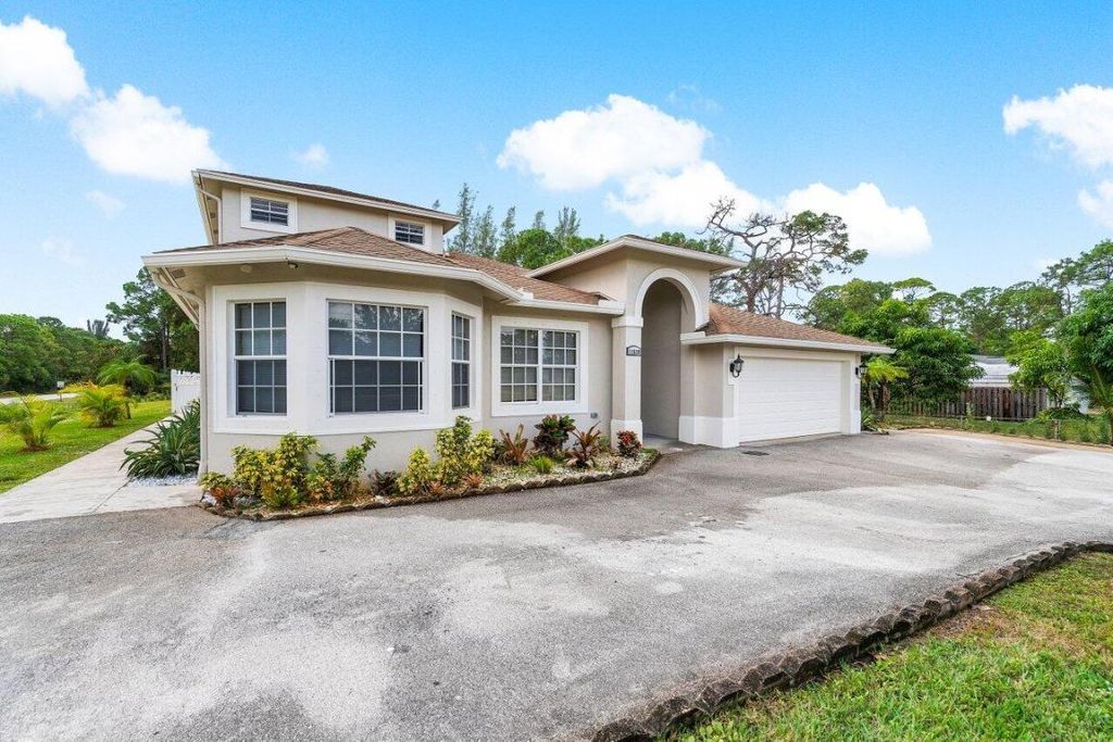 Photo of 11538 Persimmon Boulevard, West Palm Beach, FL 33411 (MLS # R11047747)