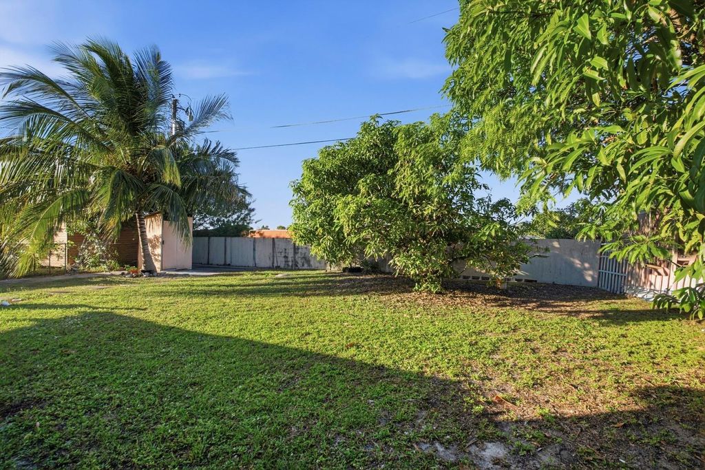 Photo of 561 NE 38th Street, Deerfield Beach, FL 33064 (MLS # F10555859)