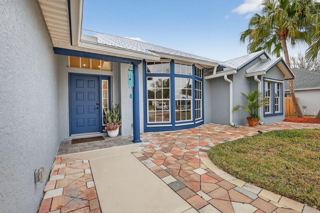 Photo of 1911 SW Janette Avenue, Port Saint Lucie, FL 34953 (MLS # R11160457)