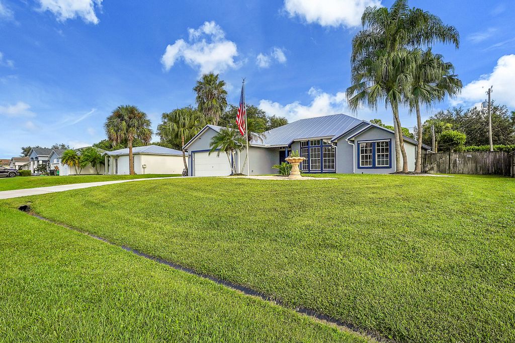 Photo of 1911 SW Janette Avenue, Port Saint Lucie, FL 34953 (MLS # R11160457)