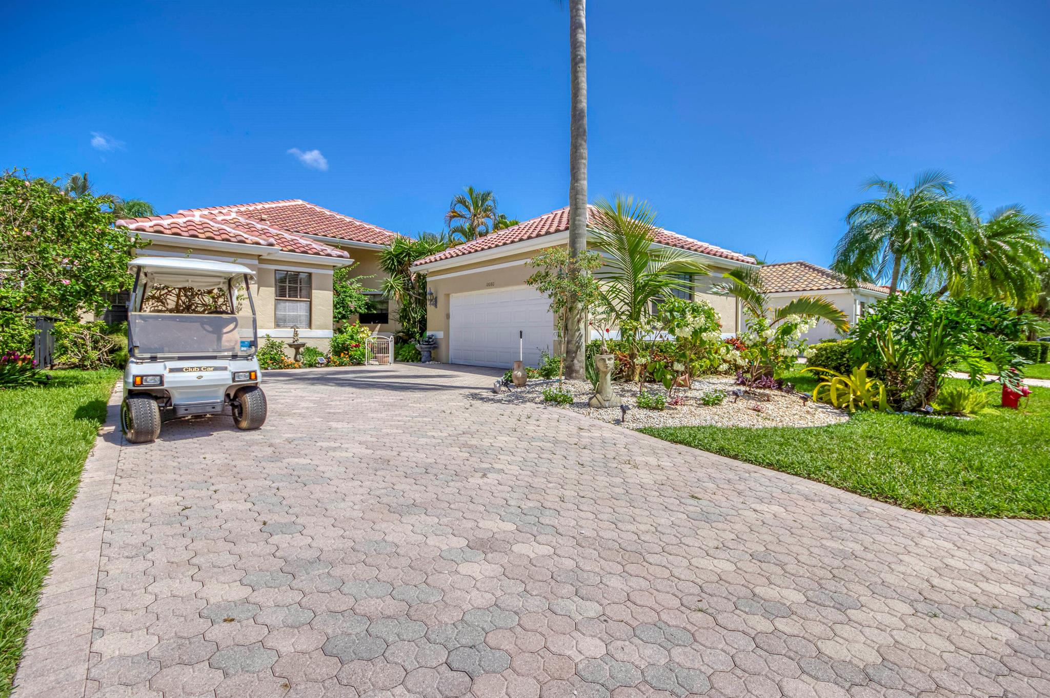 Experience your South Florida seasonal retreat in Wellington, FL Palm Beach County! Just minutes away from the Wellington Equestrian Festival, this fully furnished single-family home features 3 bedrooms, 2.5 bathrooms, 2400 living square footage and an open living area. You will also enjoy a designated dining room adjacent to the large kitchen with breakfast area. Your private screened-in lanai is situated right on the golf course with an outdoor dining area and seating. This property also includes your own golf cart, relaxing architectural design koi pond with waterfall and a a unique custom built brand new roof.