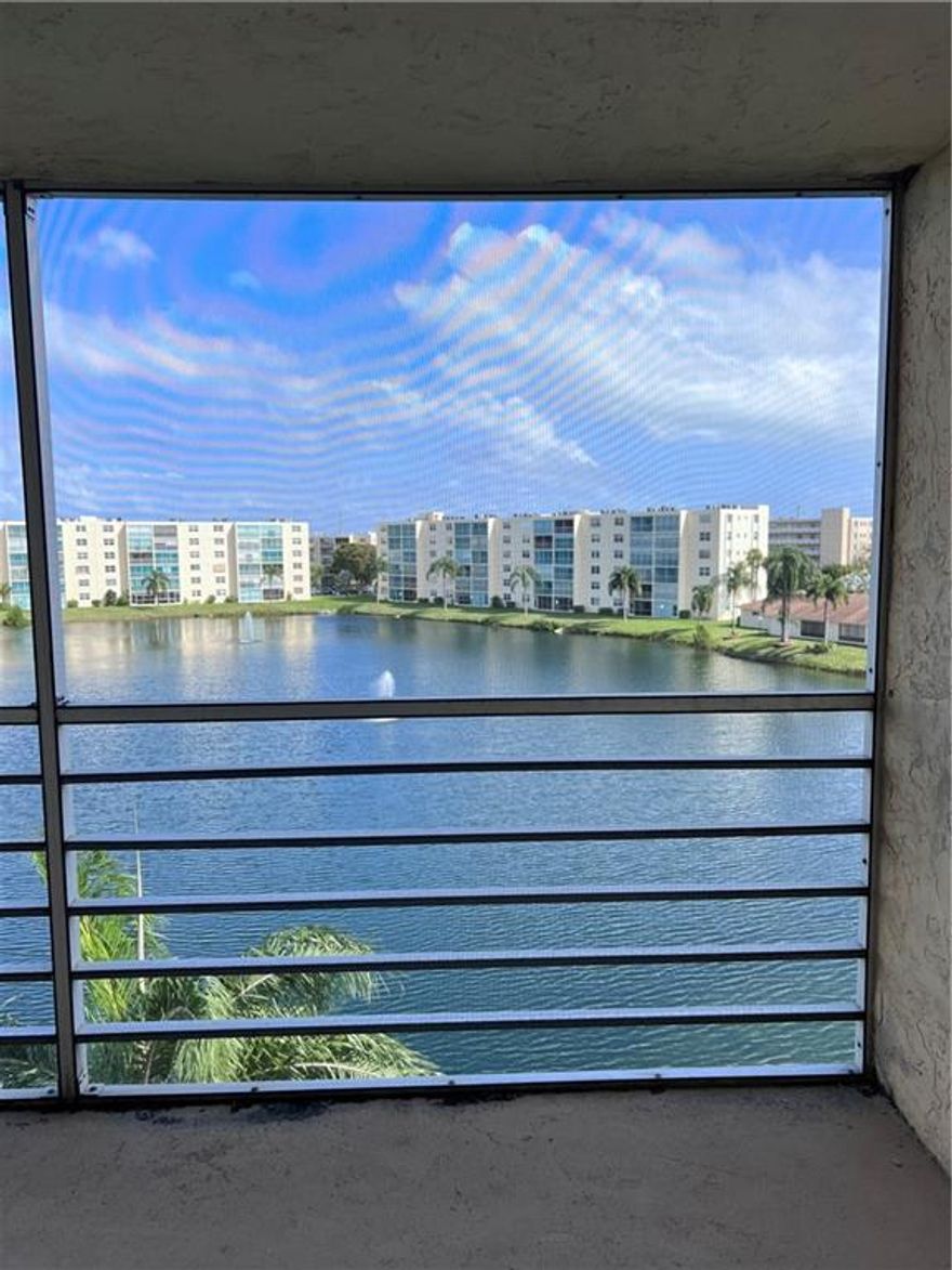 What a great LOCATION!! 2.5 miles from Dania Beach Pier, marina, and restaurants.Minutes from Dania Beach Casino.Close to the well known Hollywood and Fort Lauderdale beaches. Also close to The World Famous Gulf Stream Racetrack.10 minute ride to Fort Lauderdale airport drop off.This is a 2 bedroom 2 bathroom condo in the beautifully maintained Meadowbrook Lake 55+community.Lake view from 5 floors up.Pool, Bocci ball, and club house just steps away.Exterior catwalk to the front door makes for a nice cross breeze with the large screened in balcony.Come take a look.Showings will start on Friday March 11 from 2:00-4:00 Please call listing agent for appointment.