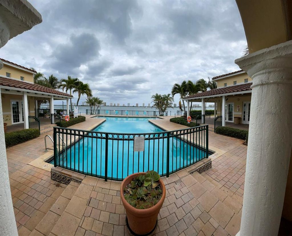 Photo of 1010 Lake Shore Drive #204, Lake Park, FL 33403 (MLS # R10775073)