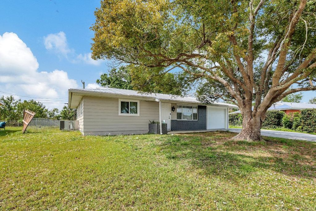 Photo of 750 SW Airoso Boulevard, Port Saint Lucie, FL 34983 (MLS # R10966106)