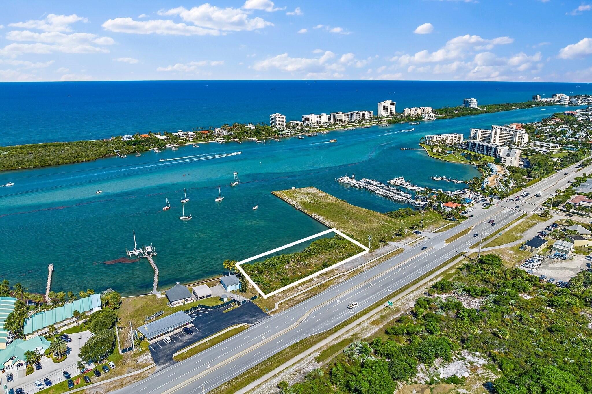 Enjoy the shimmering turquoise waters as your backdrop. Almost ONE ACRE of waterfront property is available in coveted Jupiter Florida. Build your expansive dream home or private retreat and settle into the relaxed upscale vibe. Just across from Jupiter Hills Golf Club and close to sandy beaches, the Jupiter Inlet, waterfront dining, boutiques, and natural splendor. This location offers both convenience and charm. Design-phase dock plan features 2 docks (4 slips) max. Plan has not gone through the permitting process. Additional options possible as parcel is zoned R-3A w/ Future Land Use Waterfront Commercial. All information provided is deemed reliable but not guaranteed; Buyer is advised to verify all details independently.