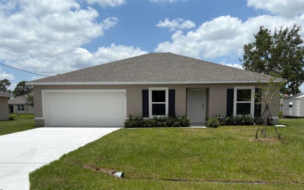 Photo of 152 SW Crescent Avenue, Port Saint Lucie, FL 34984 (MLS # R11092393)
