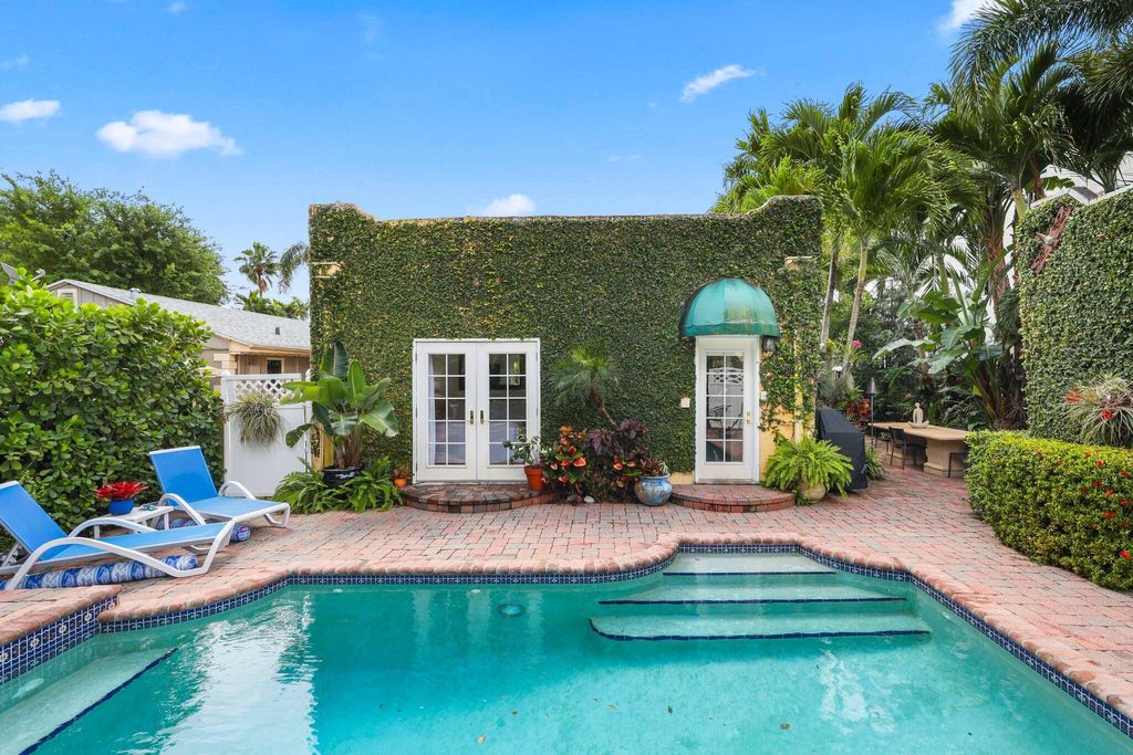 Photo of 605 Sunset Road, West Palm Beach, FL 33401 (MLS # B26012199)