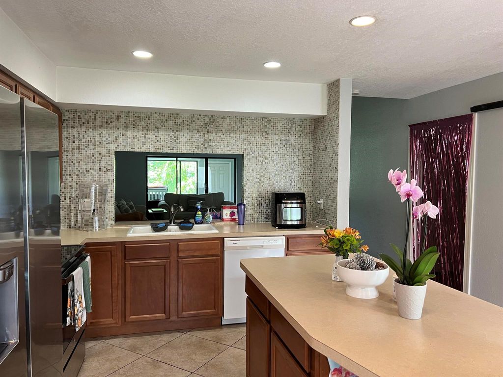 Photo of 4075 Palm Forest Drive N, Delray Beach, FL 33445 (MLS # R11023611)