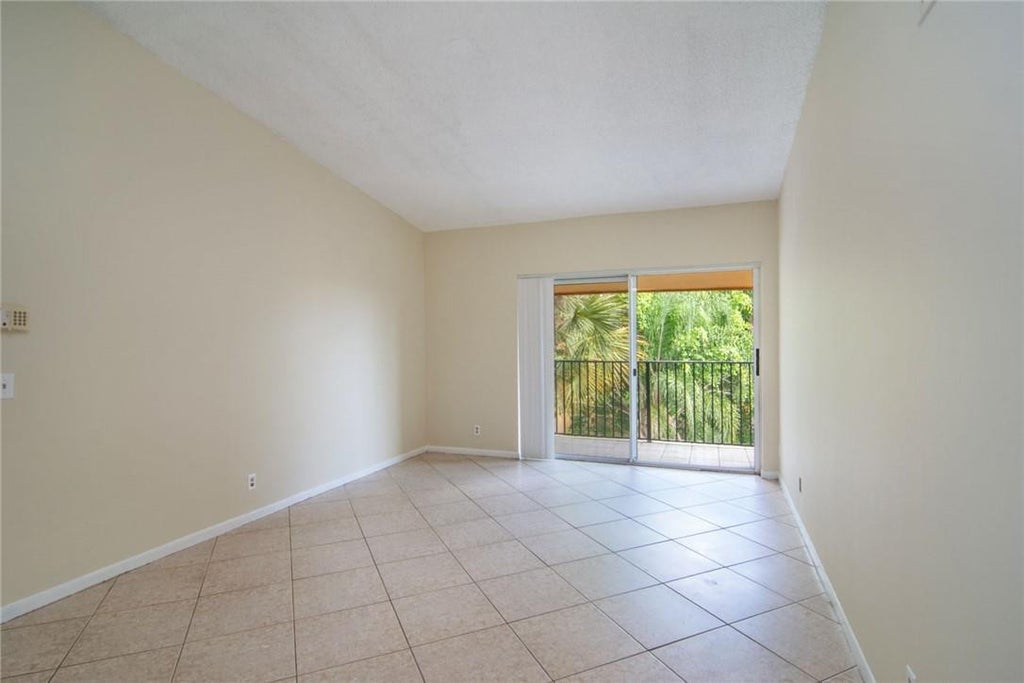 Photo of 10701 CLEARY Boulevard #306, Plantation, FL 33324 (MLS # B26085565)
