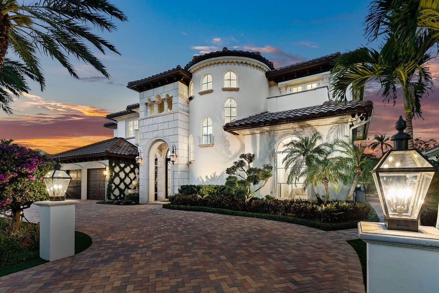 Transformed by the acclaimed P&H Interiors, 1801 Thatch Palm Drive is a masterpiece of design and craftsmanship, set along the 3rd fairway of the prestigious Royal Palm Yacht & Country Club. This impeccably maintained estate seamlessly blends refined Palm Beach architecture with modern comfort, offering an unparalleled living experience.

A dramatic foyer makes a lasting impression, leading to exquisitely designed living spaces with soaring ceilings, intricate millwork, and bespoke finishes. Designed for grand entertaining and intimate gatherings, the home features a temperature-controlled wine room, a distinguished private office, and an entertainer's club room with a full-service bar. The chef's kitchen is a study in elegance and function, effortlessly flowing into the family room and breakfast area for relaxed yet sophisticated living. Upstairs, the lavish owner's suite is a serene retreat boasting dual boutique-style dressing rooms, a private morning bar, and a spa-inspired bath adorned with marble and custom accents.

Outside, the estate's resort-style grounds invite effortless leisure, featuring a heated pool with cascading water features, a covered loggia, a fully equipped summer kitchen, and lush, manicured landscaping. Additional luxuries include impact windows, a three-car air-conditioned garage with golf cart storage, a state-of-the-art security system, and a whole-home natural gas generator. An extraordinary opportunity to experience refined golf course living in Boca Raton's most coveted enclave.