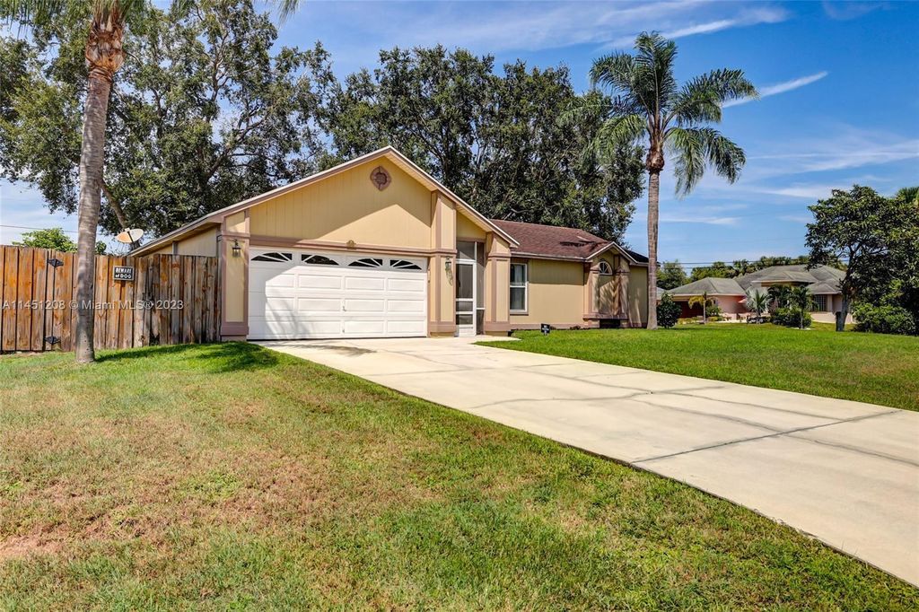 Photo of 901 SW Gaitor Avenue, Port Saint Lucie, FL 34953 (MLS # R11046746)