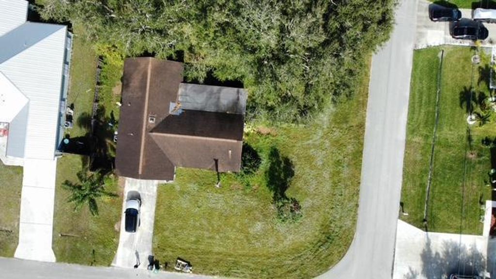 Photo of 901 SW Gaitor Avenue, Port Saint Lucie, FL 34953 (MLS # R11046746)