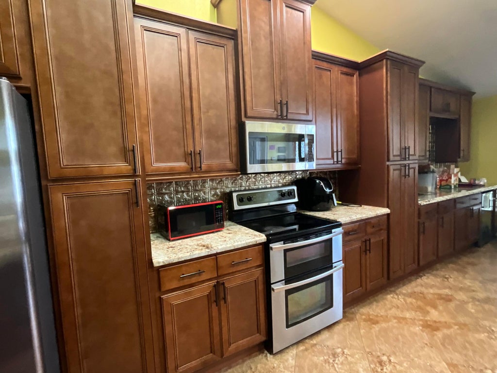 Photo of 315 SW Dwight Avenue, Port Saint Lucie, FL 34983 (MLS # B26059878)