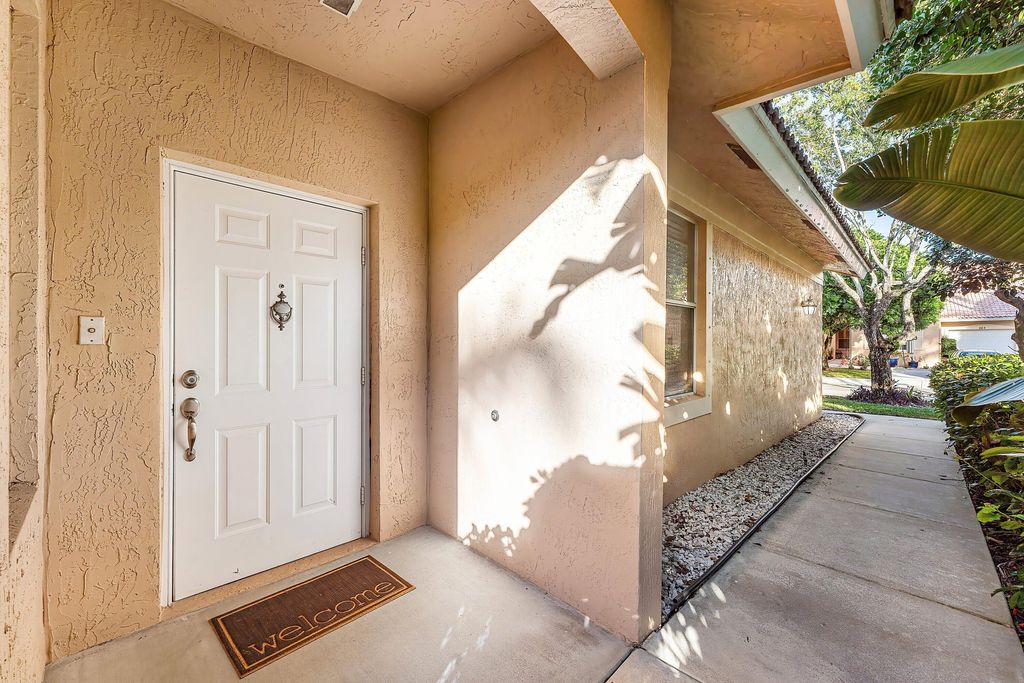 Photo of 370 Coral Trace Lane, Delray Beach, FL 33445 (MLS # R11153508)
