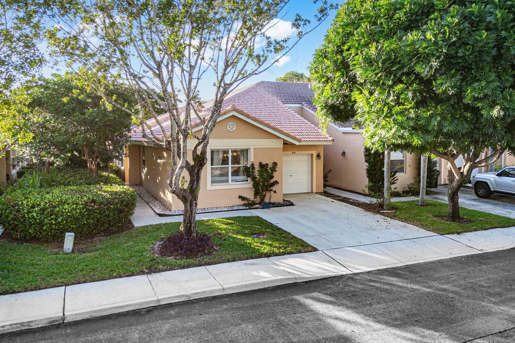 Photo of 370 Coral Trace Lane, Delray Beach, FL 33445 (MLS # R11153508)