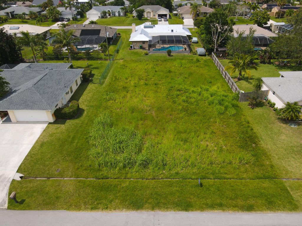 Photo of 1165 SE Mendoza Avenue, Port Saint Lucie, FL 34952 (MLS # R10863112)