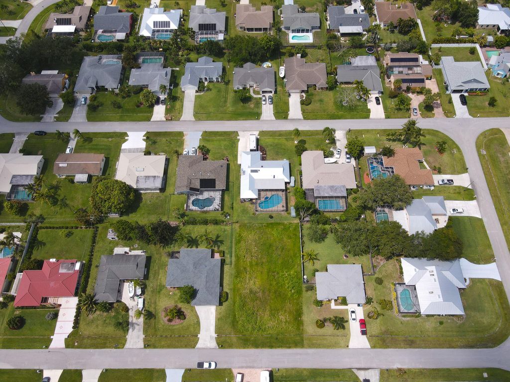 Photo of 1165 SE Mendoza Avenue, Port Saint Lucie, FL 34952 (MLS # R10863112)