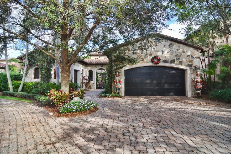 Intimate Tuscan courtyard villa home.   Enchanting rustic stone, charming cobblestone walkways and unique garden sanctuaries encompass this unparalleled retreat. CBS construction, mahogany impact resistant doors, mahogany interior French doors. Granite and marble throughout. Poplar wood cased openings. Master bedroom features natural stained Brazilian walnut. Chef's kitchen cabinets and bass wood beamed ceilings.  Custom natural gas fireplace, full cabana bath with alfresco grill . Beautifully appointed pool, spa and fountain. Just steps away from the Clubhouse.