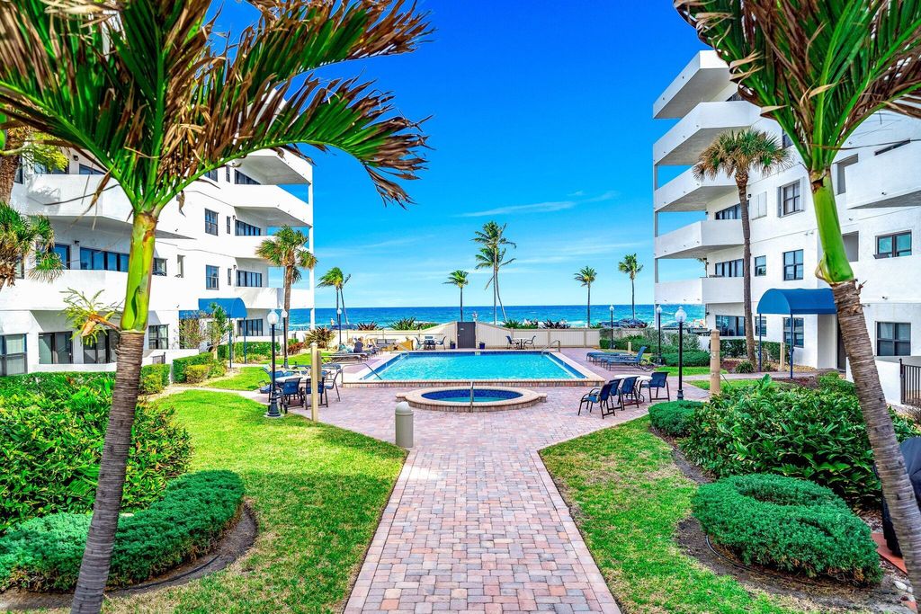 Photo of 330 SE 20th Avenue #404, Deerfield Beach, FL 33441 (MLS # R10992090)