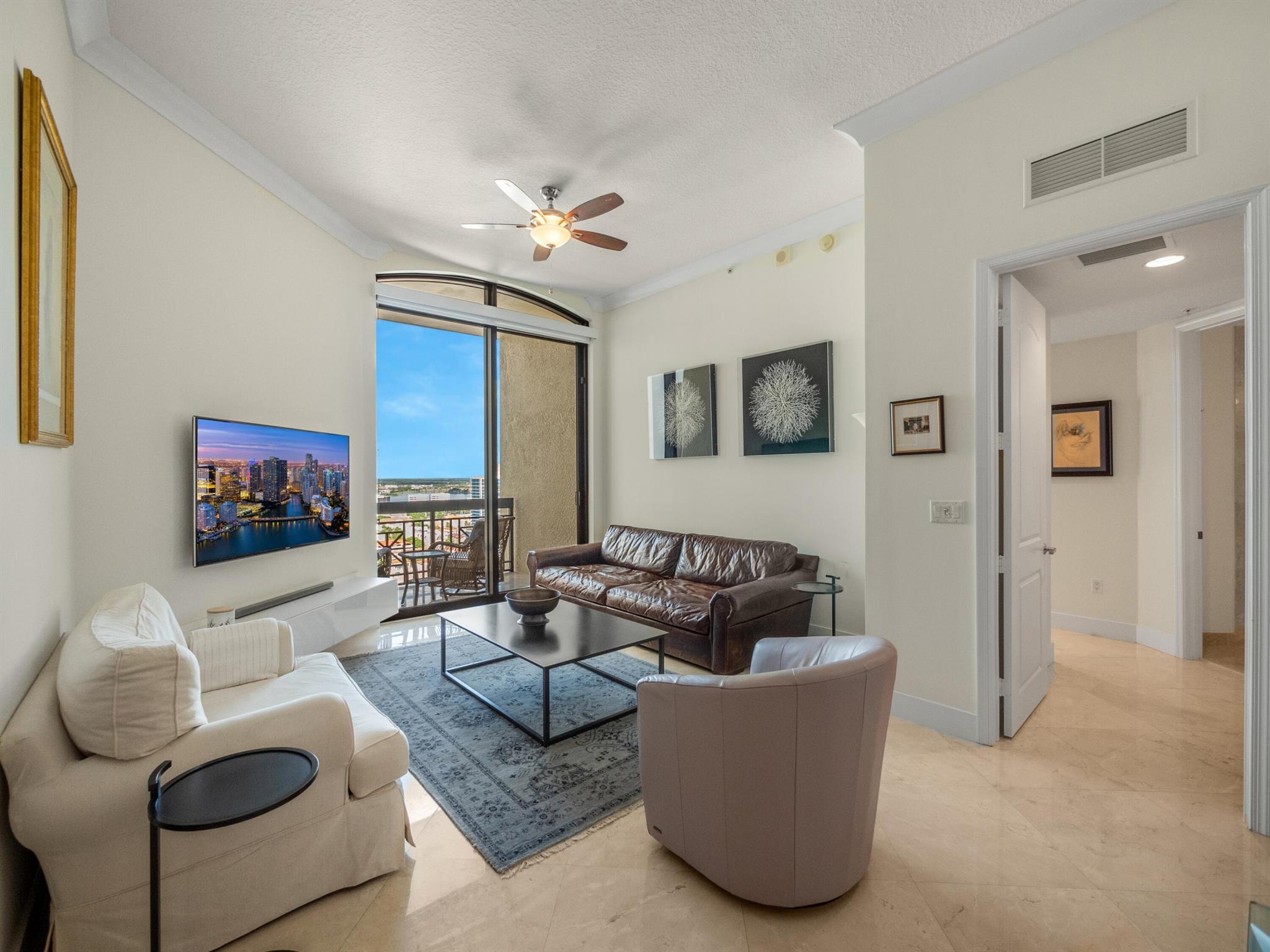 SEASONAL PENTHOUSE FURNISHED RENTAL available for 2024/2025 season. We have the perfect reason for you to spend the winter in South Florida. In addition to the great year round weather, top rated beaches and the feeling of being on vacation without leaving your condo, this is the perfect rental for you. Located in prime downtown West Palm Beach this 2 bedroom, 2 bathroom condo is located in the luxury high-rise, Two City Plaza. This top floor penthouse offers high ceiling heights and expensive views of the cityscape where you can enjoy incredible sunsets. Amenities included 24 hour front desk, secure garage parking, rooftop pool, gym equipped with a peloton bike, indoor & outdoor theater, dog walk area, Minutes to Palm Beach Island, Kravis Center, Norton Museum, restaurants, entertainment
