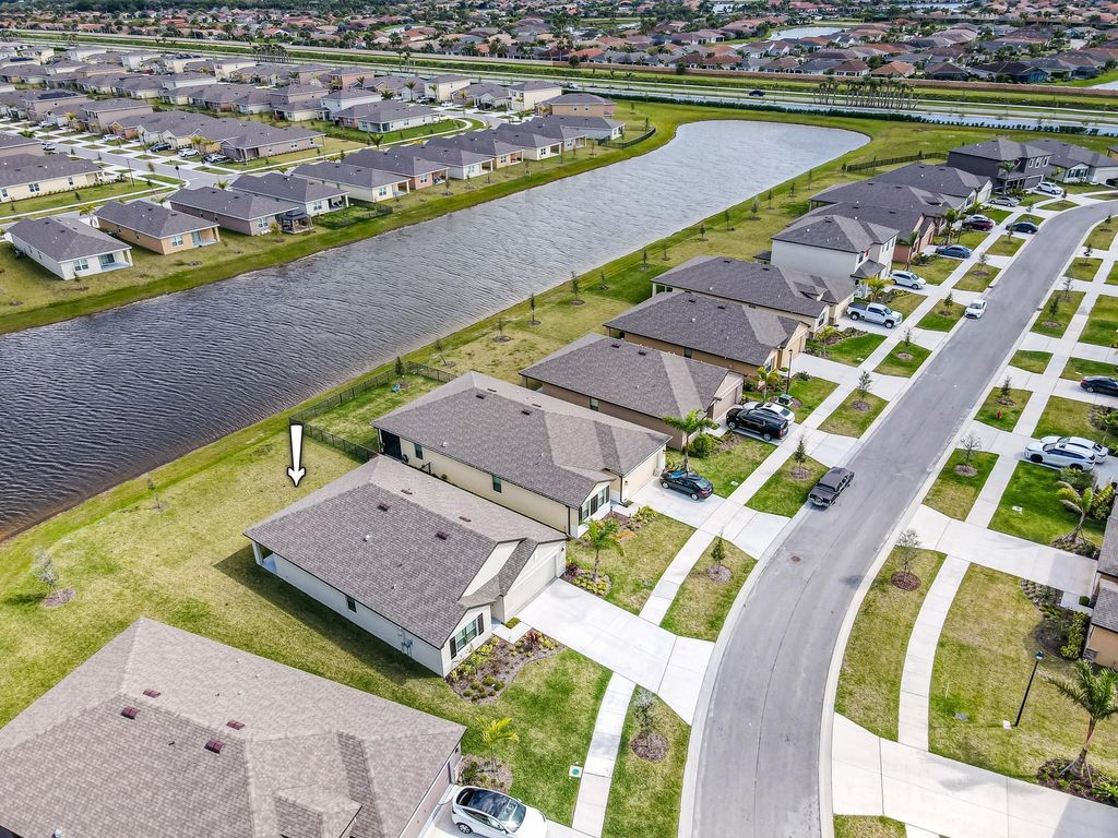 Photo of 9767 SW Triton Way, Port Saint Lucie, FL 34987 (MLS # R11034614)