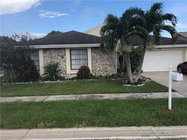 Photo of 21071 Woodspring Avenue, Boca Raton, FL 33428 (MLS # B26059075)