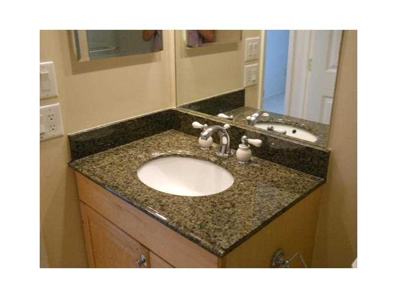 PALM-AIRE C C APTS 38 CON - Residential Lease