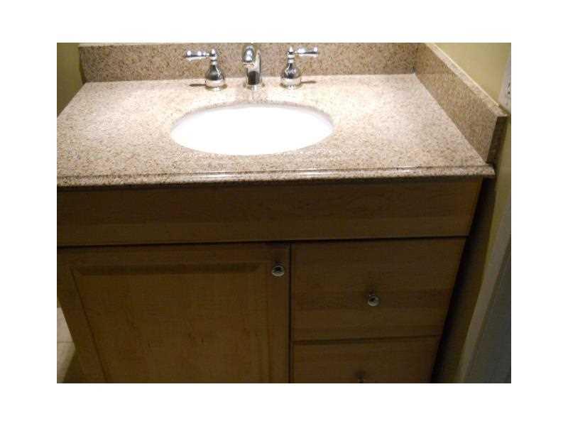 PALM-AIRE C C APTS 38 CON - Residential Lease