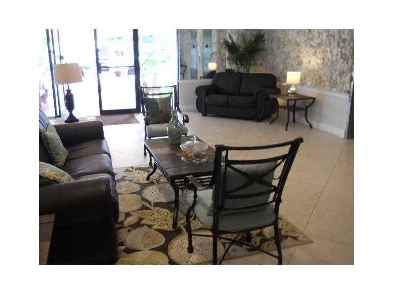 PALM-AIRE C C APTS 38 CON - Residential Lease