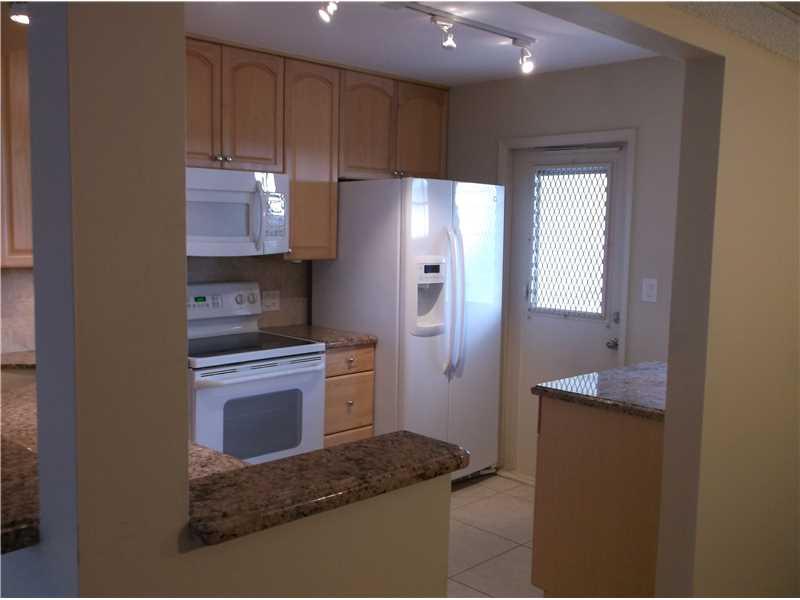 PALM-AIRE C C APTS 38 CON - Residential Lease