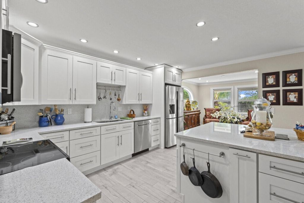 Photo of 1951 SE Erwin Road, Port Saint Lucie, FL 34952 (MLS # R11101270)