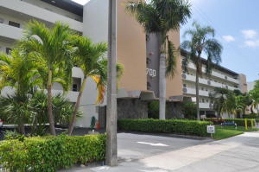 LOCATION! LOCATION! LOCATION! This light and bright first floor unit is move in ready and close to shopping, restaurants, Casino and the Diplomatic Golf Course. Only a 5 minute drive to the beach. Pride of ownership shows here. This is the only unit in the community that is equipped with its own washer and dryer. Large screened in patio with a backyard area for your outdoor patio furniture. Beautiful tree lined street in quiet neighborhood. A wonderful place to call home or escape to on your vacation time in sunny south florida! Must see to appreciate.