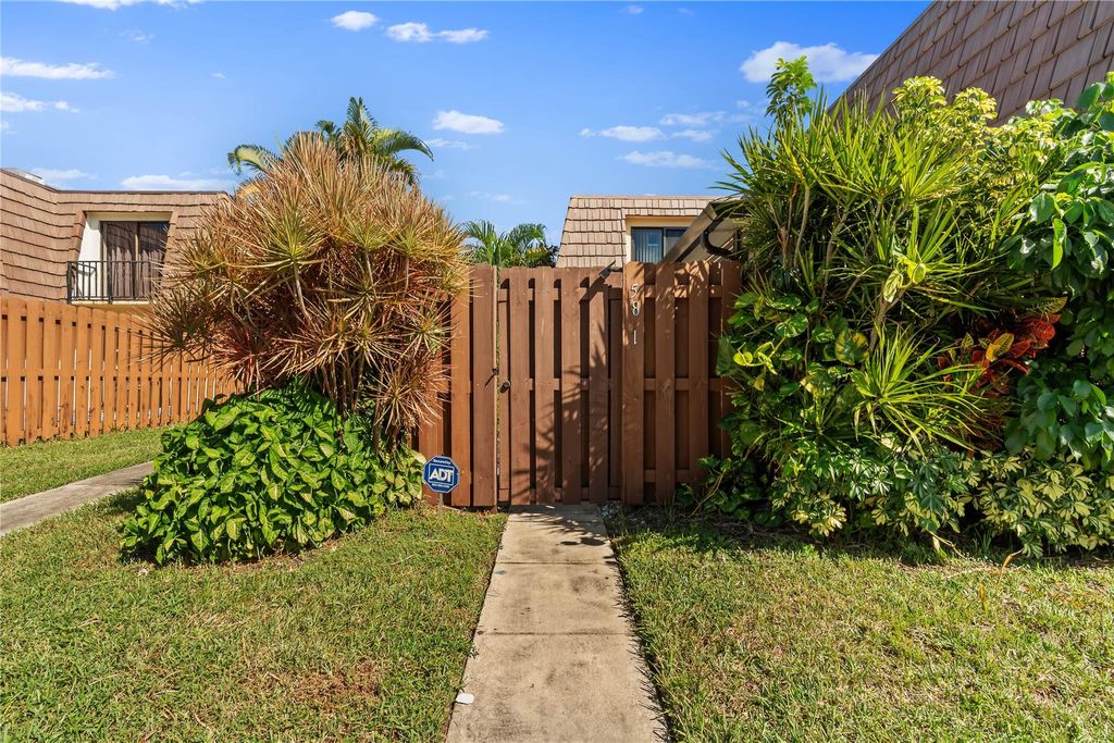 Photo of 581 Springdale Cir #58-A, Palm Springs, FL 33461 (MLS # F10530787)
