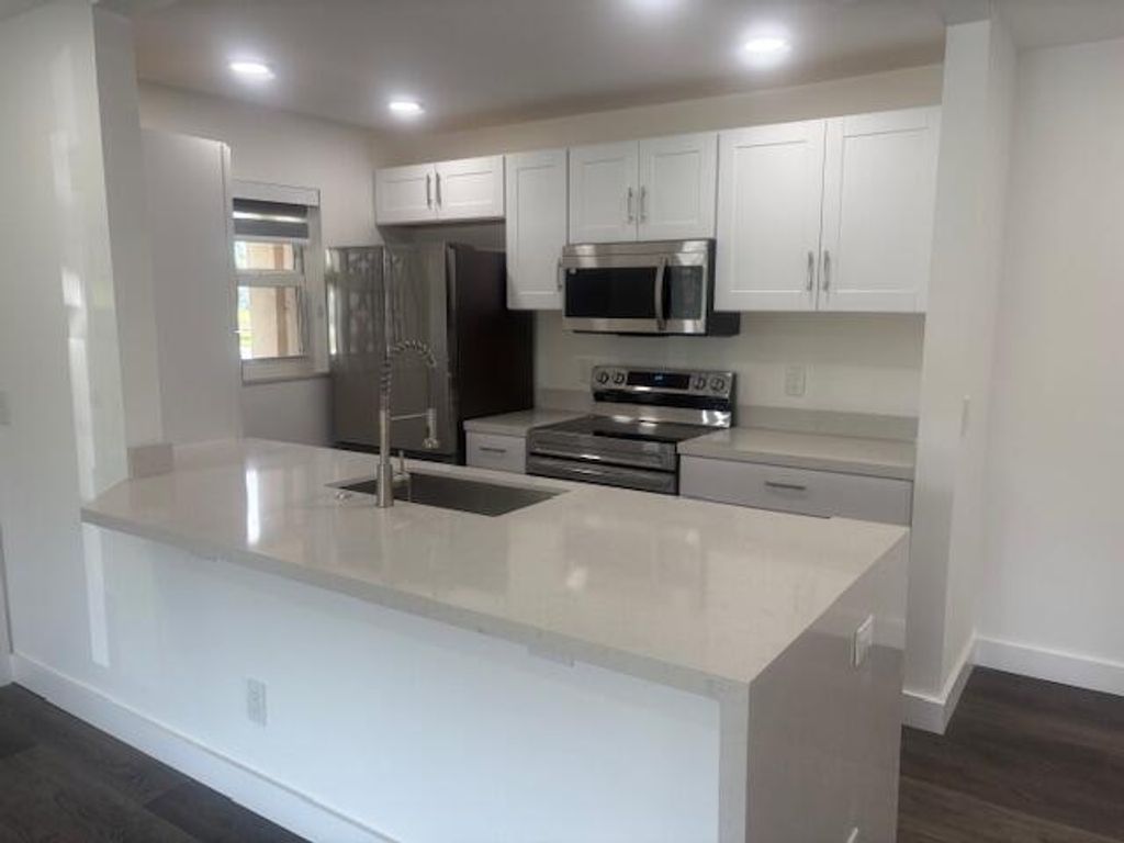 Photo of 1022 Circle Drive #D, Delray Beach, FL 33445 (MLS # R11135972)