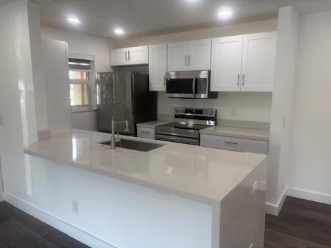 Photo of 1022 Circle Drive #D, Delray Beach, FL 33445 (MLS # R11135972) Photo of 1022 Circle Drive #D, Delray Beach, FL 33445 (MLS # R11135972)