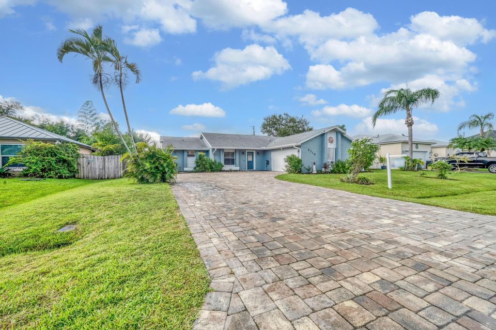 Photo of 2718 SE Buccaneer Circle, Port Saint Lucie, FL 34952 (MLS # R11130269)