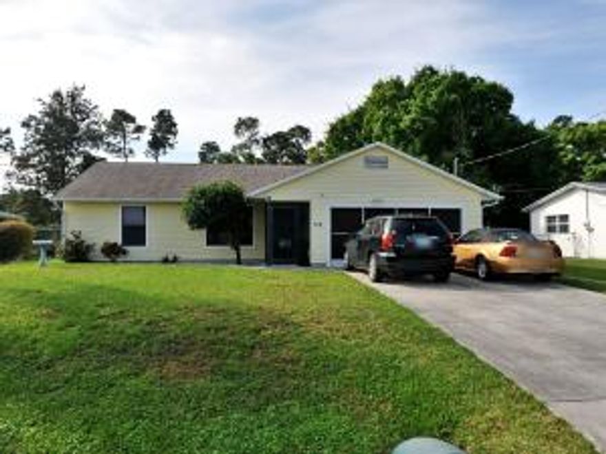 Very well kept, high lot with wood fence, outside shed, pass through Kit to pool area & den, laminated floors in bedrooms,  tile floors throughout, cabana bath, new AC,Heated pool in great condition newly surfaced self clean, all new app staying, easy to show.