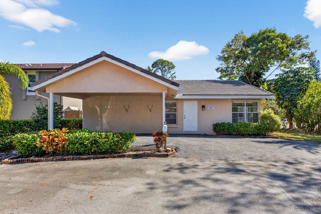 Photo of 8938 Shadow Wood Boulevard, Coral Springs, FL 33071 (MLS # R11143052)