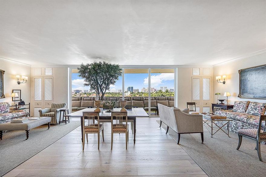 Rarely do you find an apartment of this extraordinary level of taste and renovation.  No expense has been spared, from the pale wide plank oak flooring throughout, to the custom-built English natural oak library walls, to the finest chef's kitchen and bathrooms and so much more!  Enter into the expansive living room with two seating areas and a dining area to be greeted by the most breathtaking panoramic views over the town.  Relax and entertain on the long terrace.  This
apartment truly lives like a home. The prestigious Lowell House, located next to the ocean, and only 3 blocks to Worth Avenue,  has a full time doorman and manager, with a lovely club/games room, pool and fitness room. Two car
garage parking and one pet up to 70lbs. The building is undergoing a total upgrade to be finished by the summer.