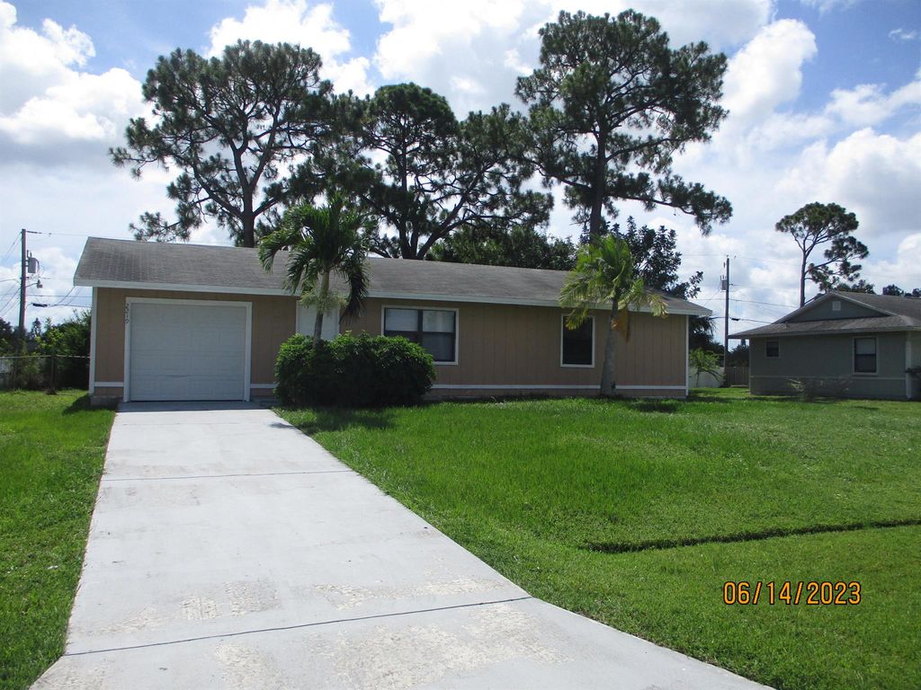 Photo of 2219 SW Franklin Street, Port St Lucie, FL 34953 (MLS # R10897239)